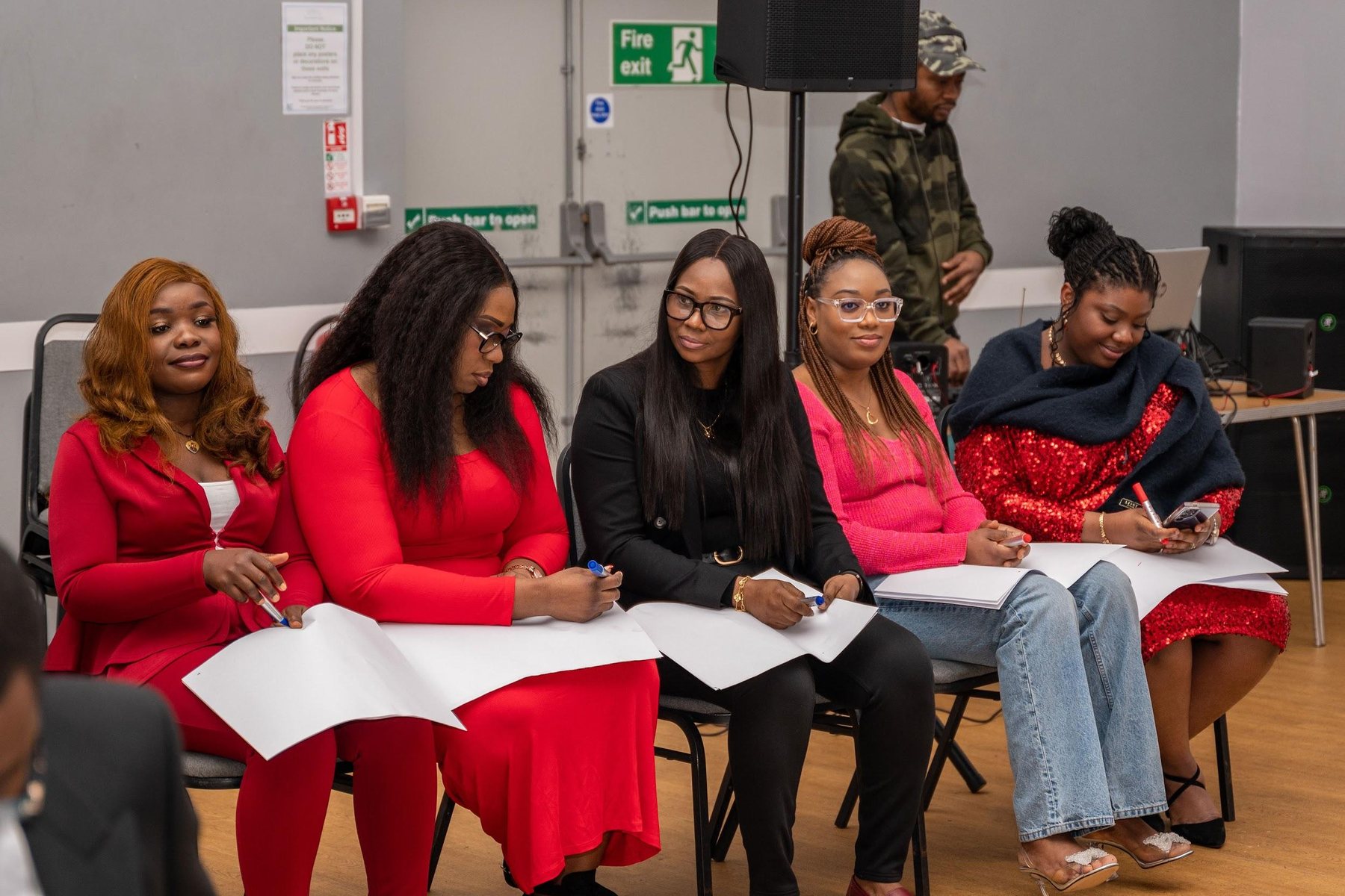 Audience members at an MC Crown hosted event